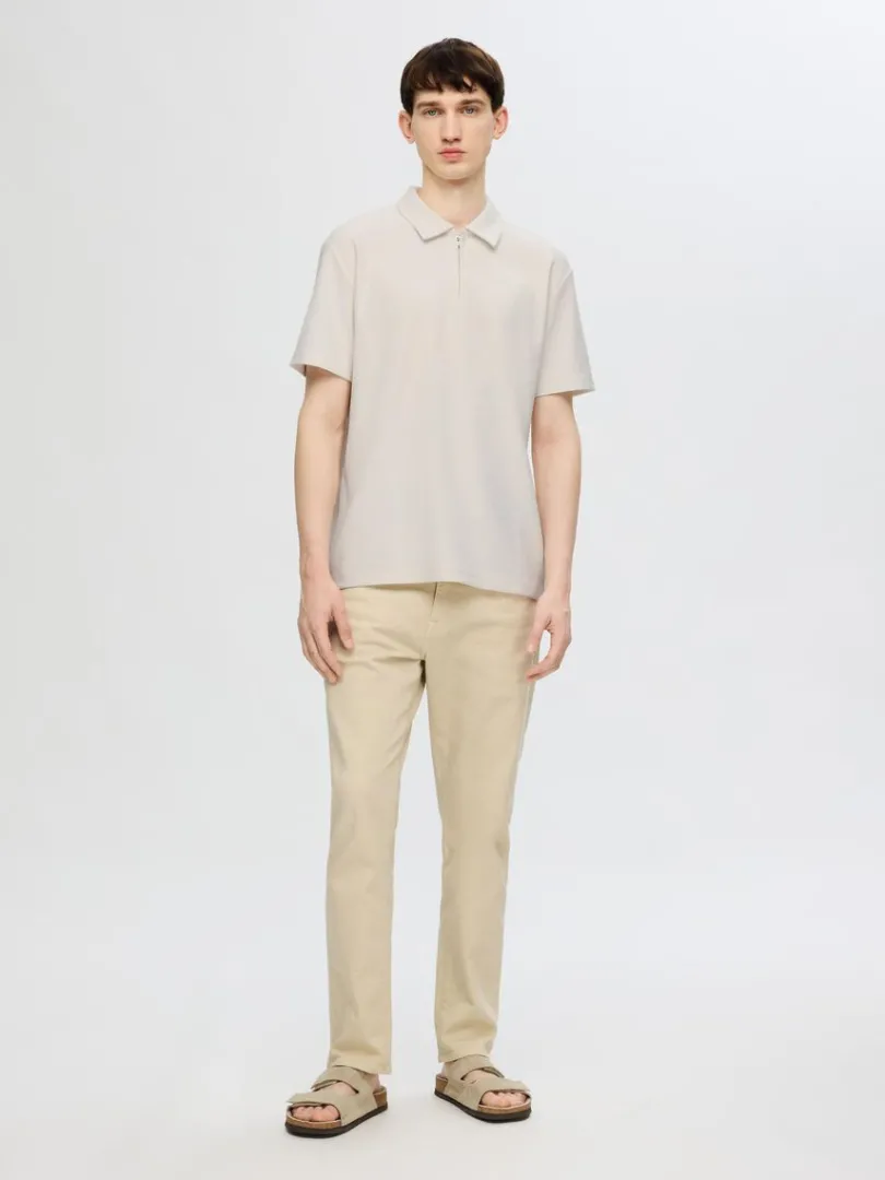 halv_lynls_pliss_polo_1.webp Poloer>SELECTED HALV LYNLÅS PLISSÉ POLO Beige