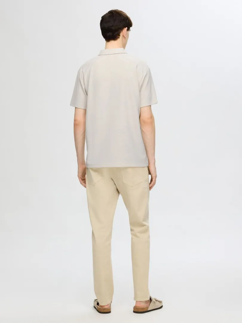 halv_lynls_pliss_polo_5.webp Poloer>SELECTED HALV LYNLÅS PLISSÉ POLO Beige