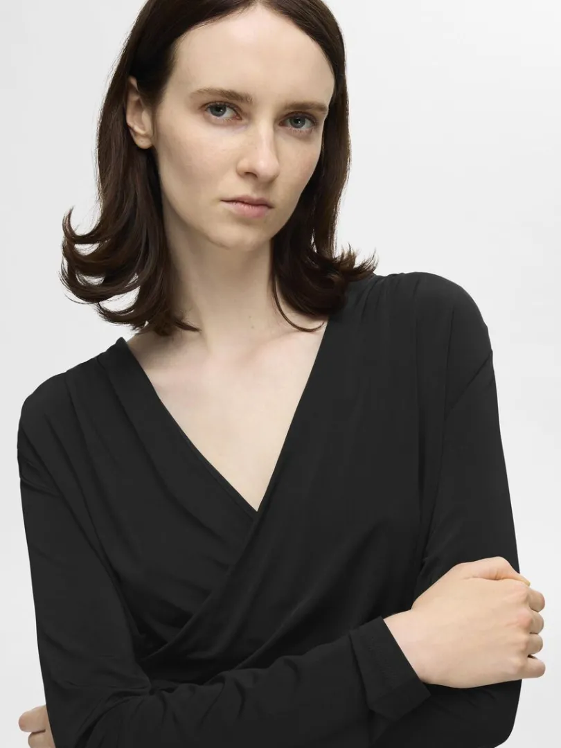 langrmet_slom_bluse_2.webp Toppe Og Bluser>SELECTED LANGÆRMET SLÅ-OM BLUSE Black