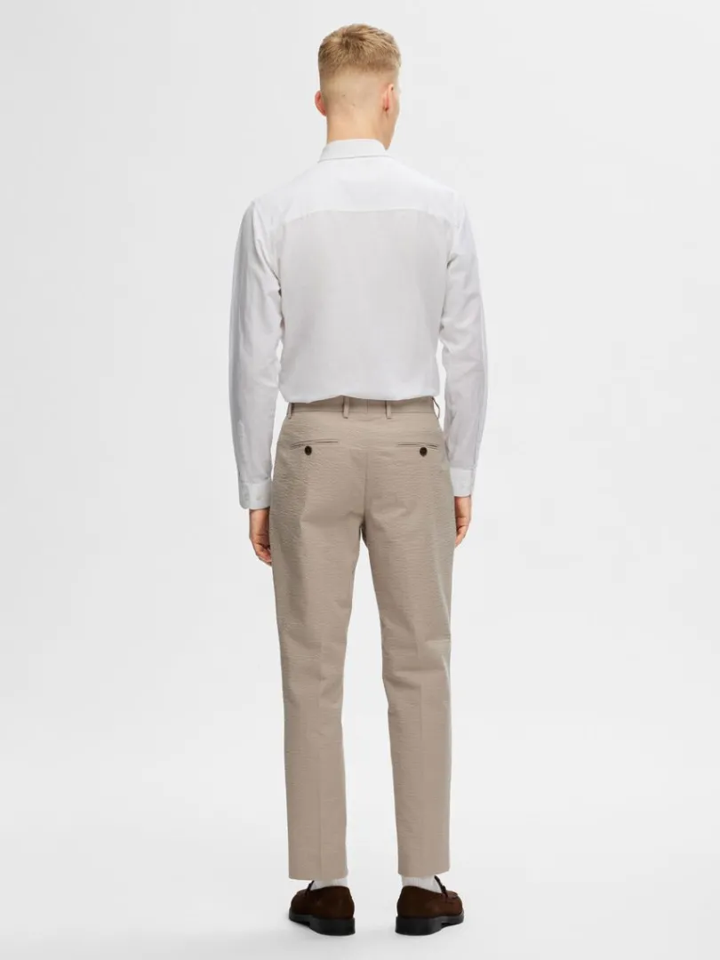seersucker_habitbukser_1.webp Bukser>SELECTED SEERSUCKER HABITBUKSER Beige