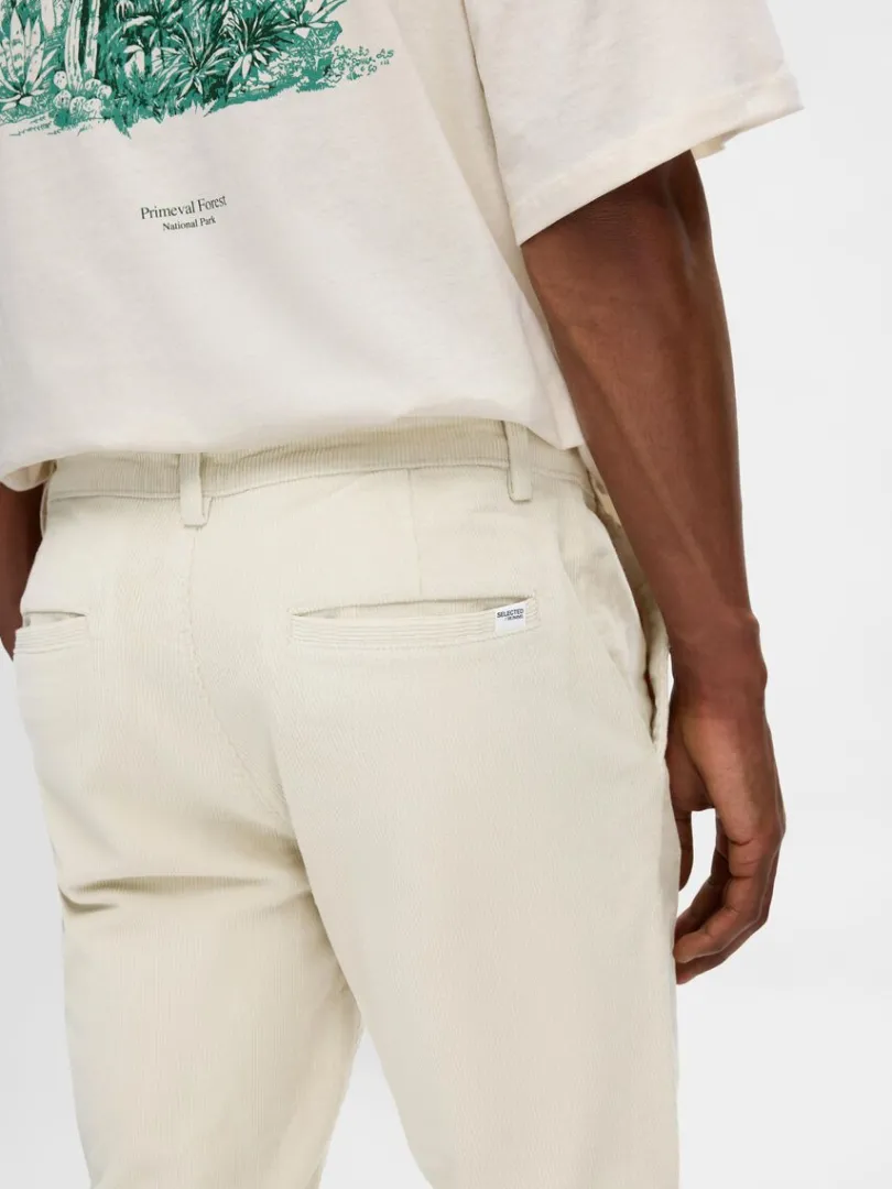 slim_fit_fljlsbukser_5.webp Bukser>SELECTED 175 SLIM FIT FLØJLSBUKSER Beige