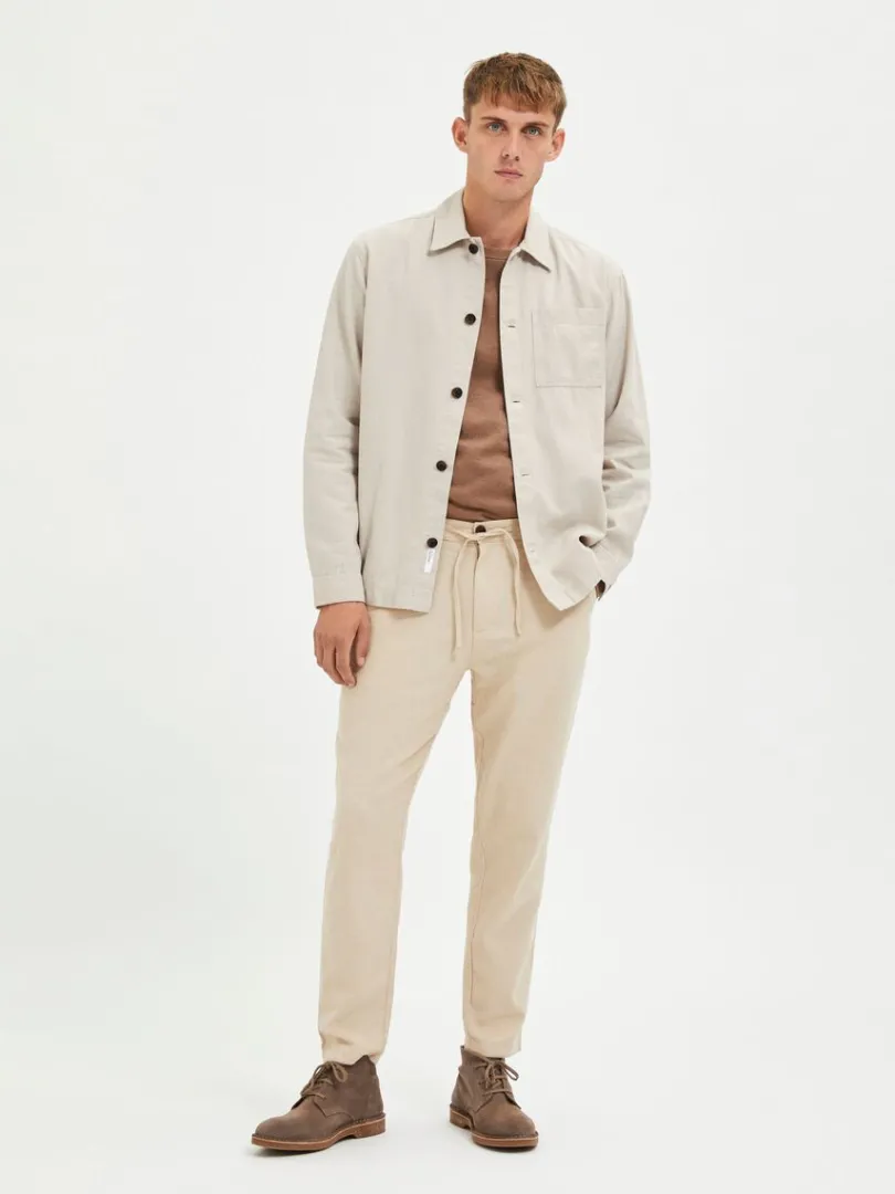 slim_fit_tapered_bukser_2-1.webp Bukser>SELECTED SLIM FIT TAPERED BUKSER Beige