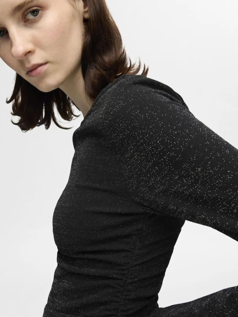 vendbar_glitter_maxikjole_2.webp Kjoler>SELECTED VENDBAR GLITTER MAXIKJOLE Black